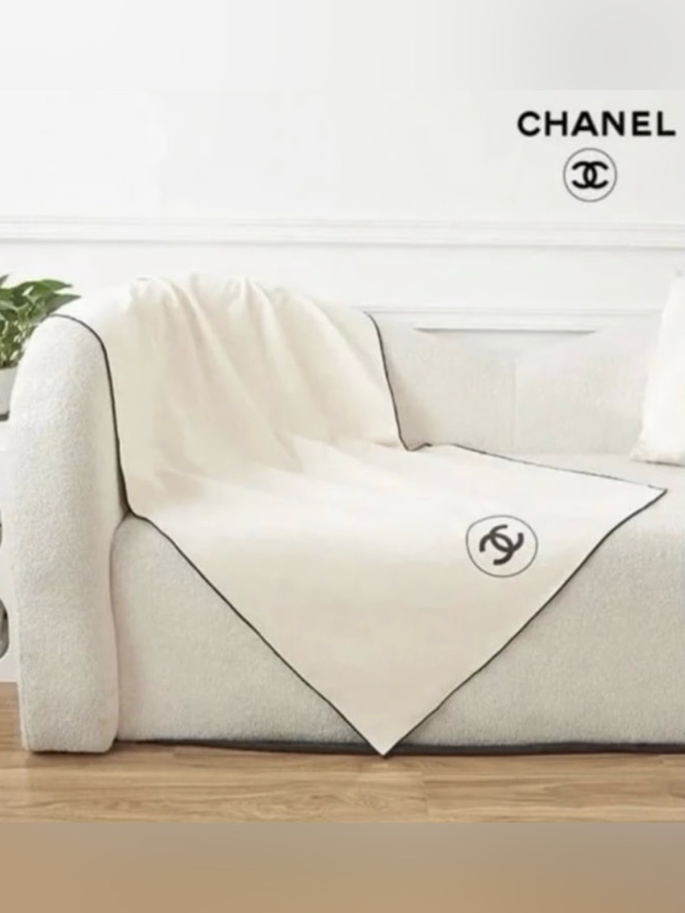 Ivory Throw with Black Emblem